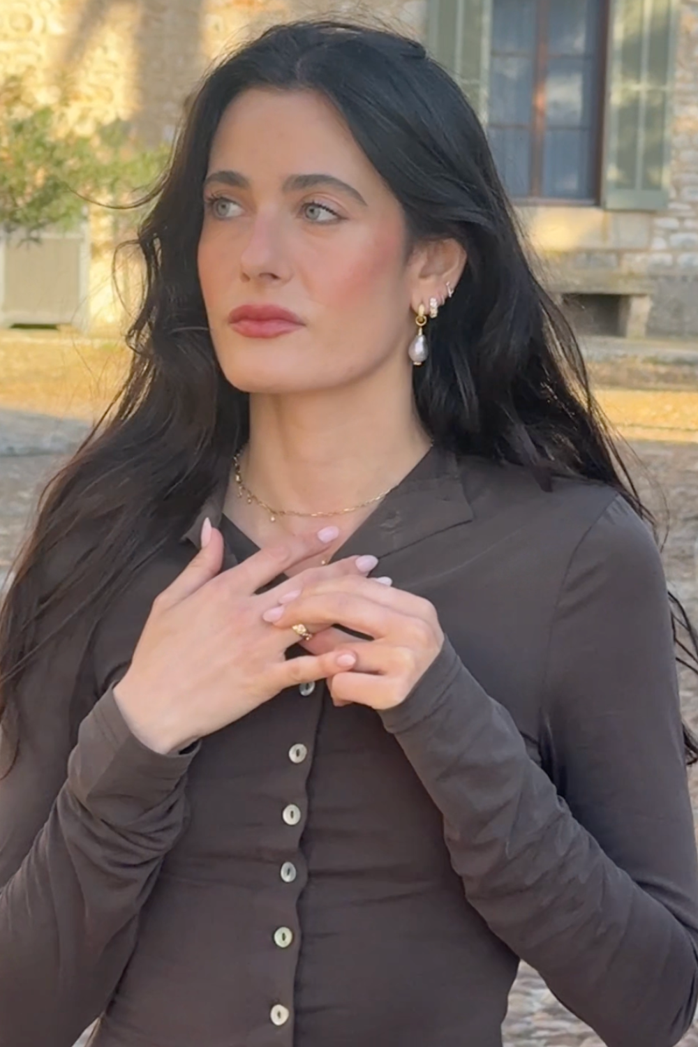 Featuring Emily Singer in the Margaux Baroque Pearl Earrings, Étoile Huggies and Celestial Prayer Ring